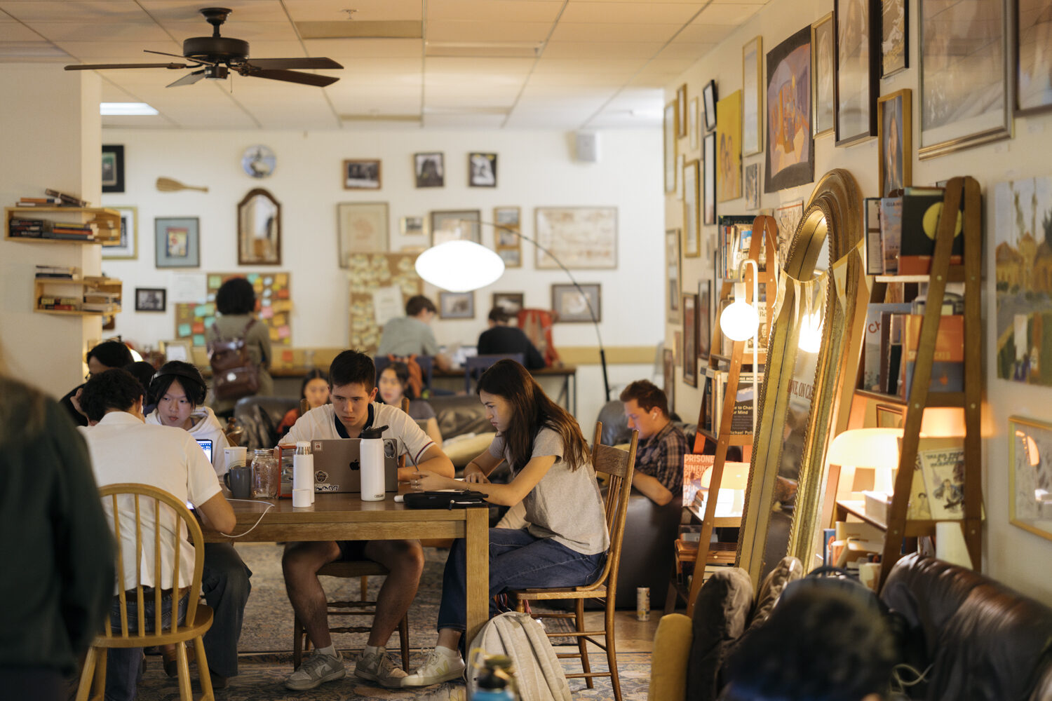 On Call Café - students studying in the art-filled space
